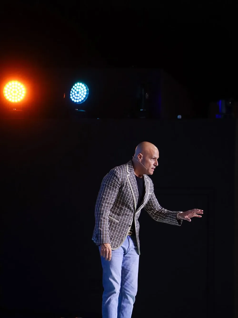 Chris Sarno speaking on stage