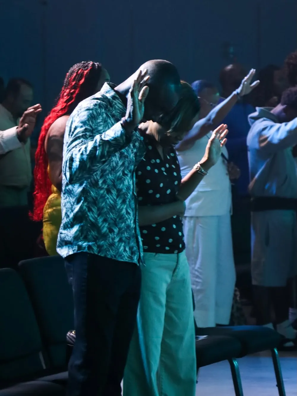 A congregation in prayer